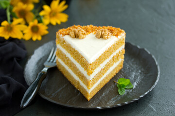 Delicious carrot cake with nuts. Selective focus.