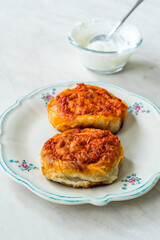 Turkish Traditional Food Borek Manti with Minced Meat, Tomato Paste and Yogurt / Yoghurt Burek Dumplings Sosyete Mantisi.