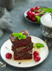 Chocolate brownie cakes with cherry. selective focus.