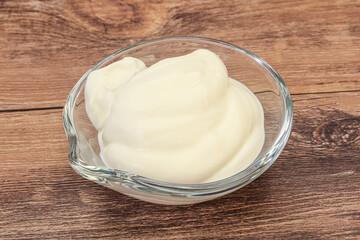 Sour cream in the bowl