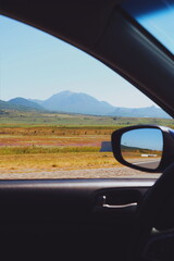 mountain view from the car window. road trip
