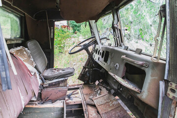 old car broken by marauders in pripyat