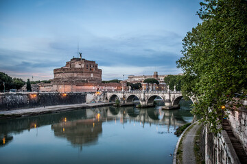 Fototapeta na wymiar Castel Sant'angelo and the bridge of Sant'angelo across the Tiber in Rome on a may evening. Rome, Lazio, Italy
