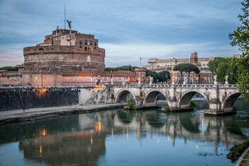 Castel Sant'angelo and the bridge of Sant'angelo across the Tiber in Rome on a may evening. Rome,...