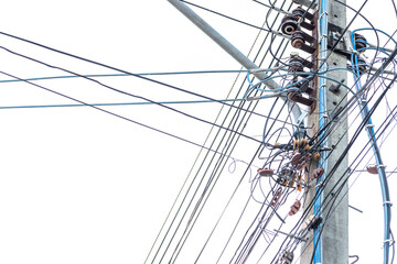 The wires tangled on the electric post. Messy electrical cables and wires on electric pole.