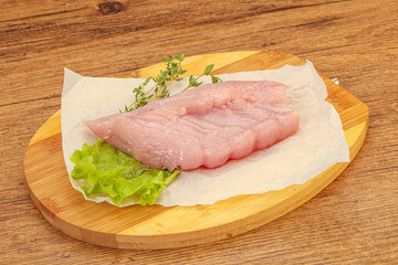 Raw turkey breast steak for cooking