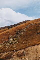 hill view. grassy mountainside. rise in height