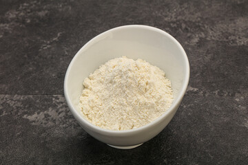 Wheat flour heap in the bowl