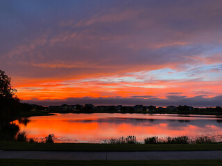 Beautiful pink, orange and blue sunset reflecting on a lake
