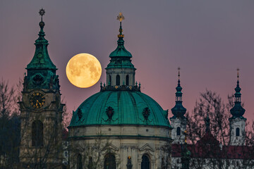 full moon over Prague and the Strahov Monastery