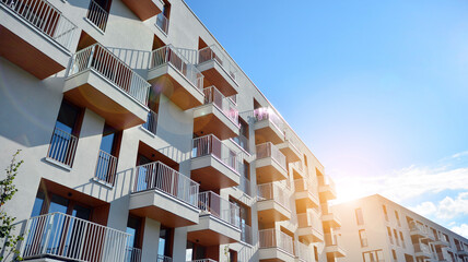 Apartment residential house and home facade architecture and outdoor facilities. Blue sky on the...