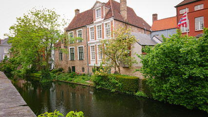 Obraz na płótnie Canvas Beautiful View Of Authentic Houses Above The Canal In The Belgian City Of Bruges.