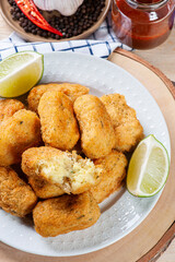 .Codfish cake, very traditional in Portuguese cuisine. Made of cod and potato. Top view