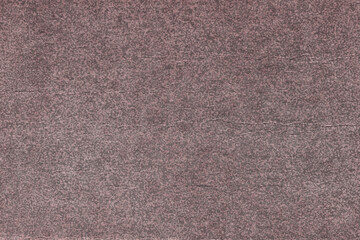 Vintage and old looking paper background. Colored red retro book cover. Ancient book page.