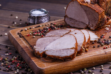 veal roll on wooden board