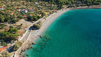 Fototapeta na wymiar Aerial drone photo of beautiful seaside village and turquoise beach of Porto Germeno, Corinthian gulf, West Attica, Greece
