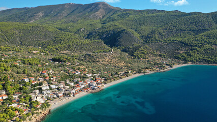 Obraz premium Aerial drone photo of beautiful seaside village and turquoise beach of Porto Germeno, Corinthian gulf, West Attica, Greece