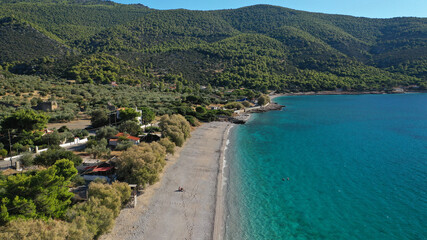 Aerial drone photo of beautiful seaside village and turquoise beach of Porto Germeno, Corinthian...