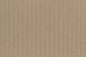 Close up of a light brown vintage rough sheet of carton. Cardboard paper texture with a blank background. Empty papercraft surface. Recycled environmentally friendly material.
