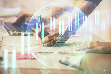 Multi exposure of woman hands typing on computer and financial chart hologram drawing. Stock market analysis concept.