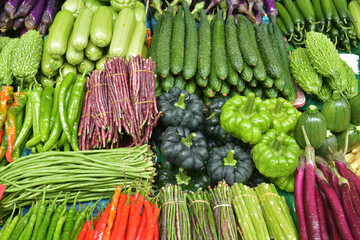 Different fresh vegetables on the stall for sale in the market in Kunming of China