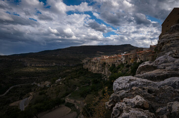 Fototapeta na wymiar Landscape of the medieval town of Cantavieja with the houses on the edge of the cliff. Teruel, Spain