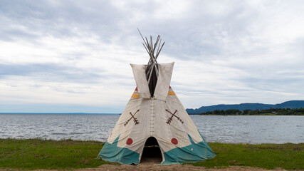 View of a tipi by the sea, in Gesgapegiag, an indian reserve located in Canada