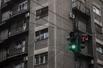 Green light on a Traffic light abiding by European standard regulations taken at a crossroad,...