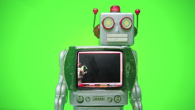 retro TV robot teacher learn to code with a spinning head and green screen background   stop motion loop 