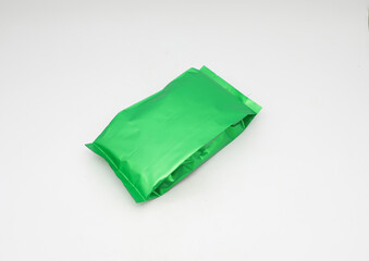 green tea bags on white background.