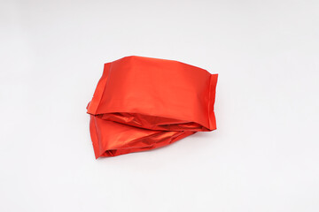 red plastic bag white background.