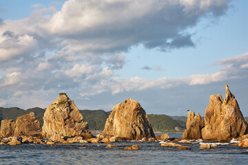 Naklejka premium Hashigui-iwa (Bridge Pillar Rocks) at the Kushimoto. Wakayama prefecture. Honshu. Japan