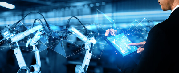 Smart industry robot arms for digital factory production technology showing automation...