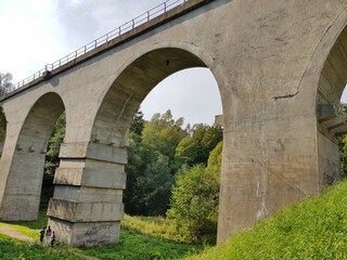 Fototapeta premium Stone piers of the old railway bridge