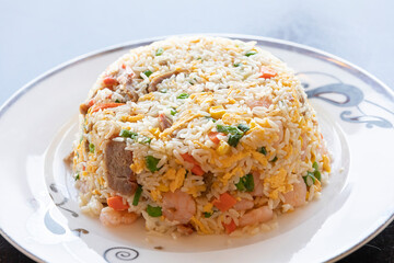 Chinese food fry rice on a plate close up