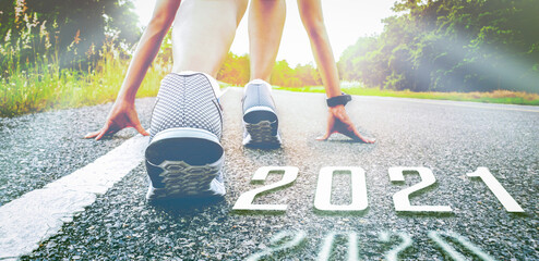 Start 2021 symbolises the start into new year. The start of people running on street is healthy new...