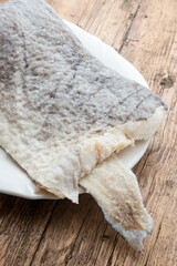 Slice of raw salted codfish