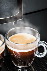 two glass Cup of coffee Prepared on the coffee machine
