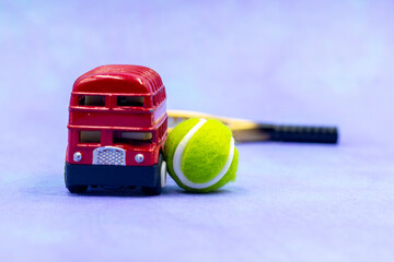Tennis ball and London Bus