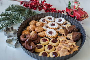 Traditional home made German Christmas Cookies on a festive table
