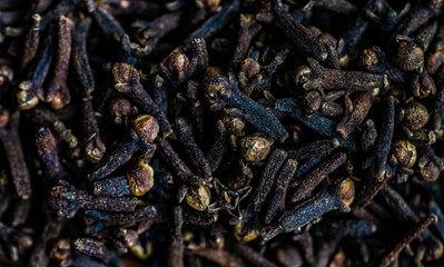 Cloves spices on stone background