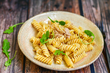  Italian home made   fusilli pasta  with  tuna  fish, parmesan cheese and black pepper .