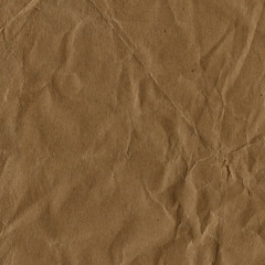 Classic vintage and old looking crumpled paper background. Retro cardboard texture. Grunge paper for drawing. Ancient book page. Present wrapping.