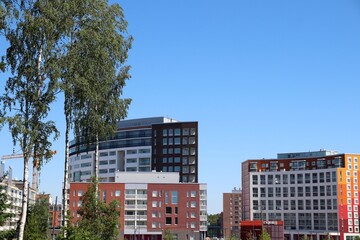 Urban colorful apartment houses in a modern new neighbourhood called Kivist&ouml; in Vantaa, Finland. Scandinavian architecture. Selective focus.