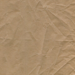 Classic vintage and old looking crumpled paper background. Retro cardboard texture. Grunge paper for drawing. Ancient book page. Present wrapping.