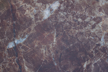 Red marble texture with black and white veins. Background