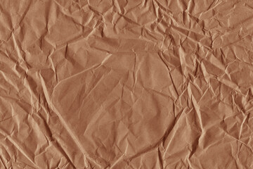 Classic vintage and old looking crumpled paper background. Retro cardboard texture. Grunge paper for drawing. Ancient book page. Present wrapping.