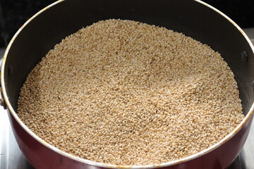 Organic natural Til Gul OR Sesame seeds over white background