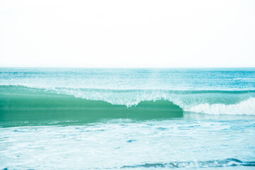 Ocean waves crashing  on the shore