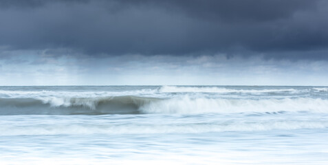 Ocean waves crashing  on the shore